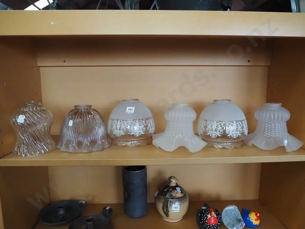 shelf of glass light shades Image 1++