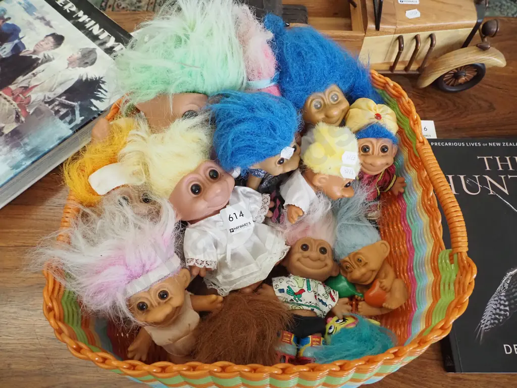plastic basket of troll dolls Image 1++