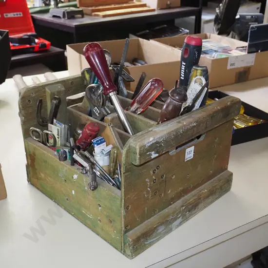homemade wooden tool carrier; chisels, stapler etc