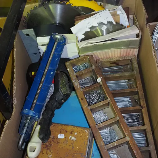 box; caulking gun, nails, saw blades etc