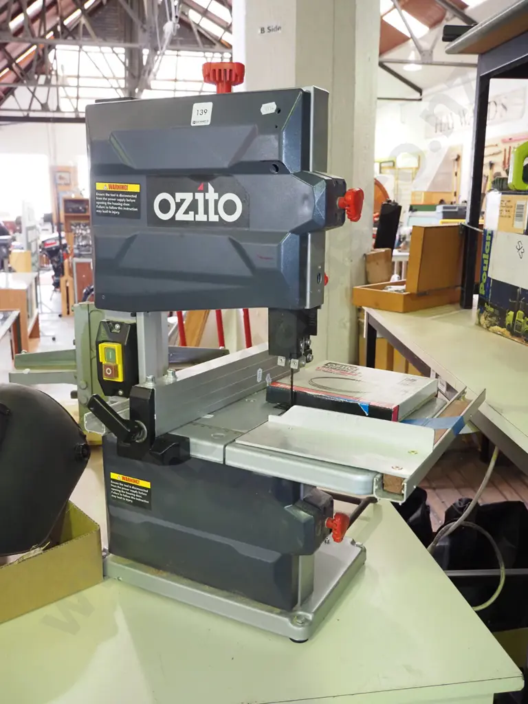 small Ozito bandsaw with additional blade Image 1++