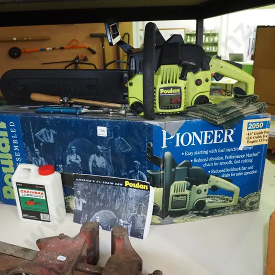 Poulan chainsaw with box and accessories