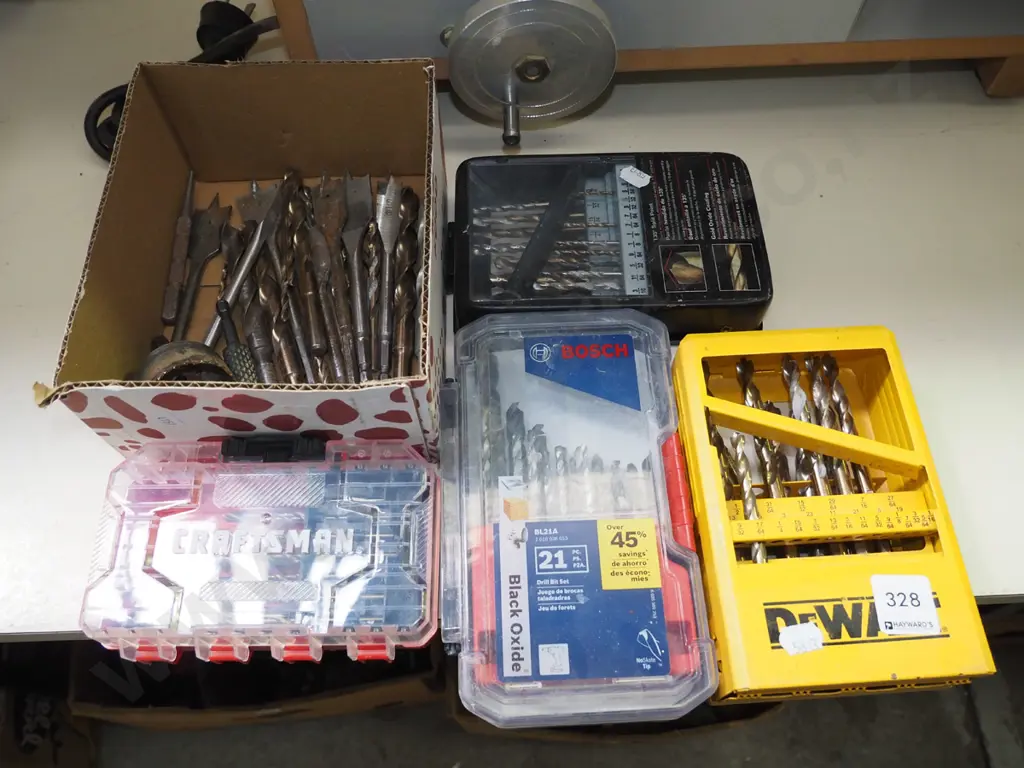 1x box, 4x cases of drill bits Image 1++