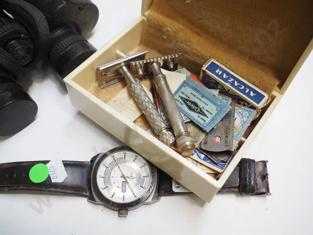 wristwatch, pair of binoculars, vintage safety razor Image 1++