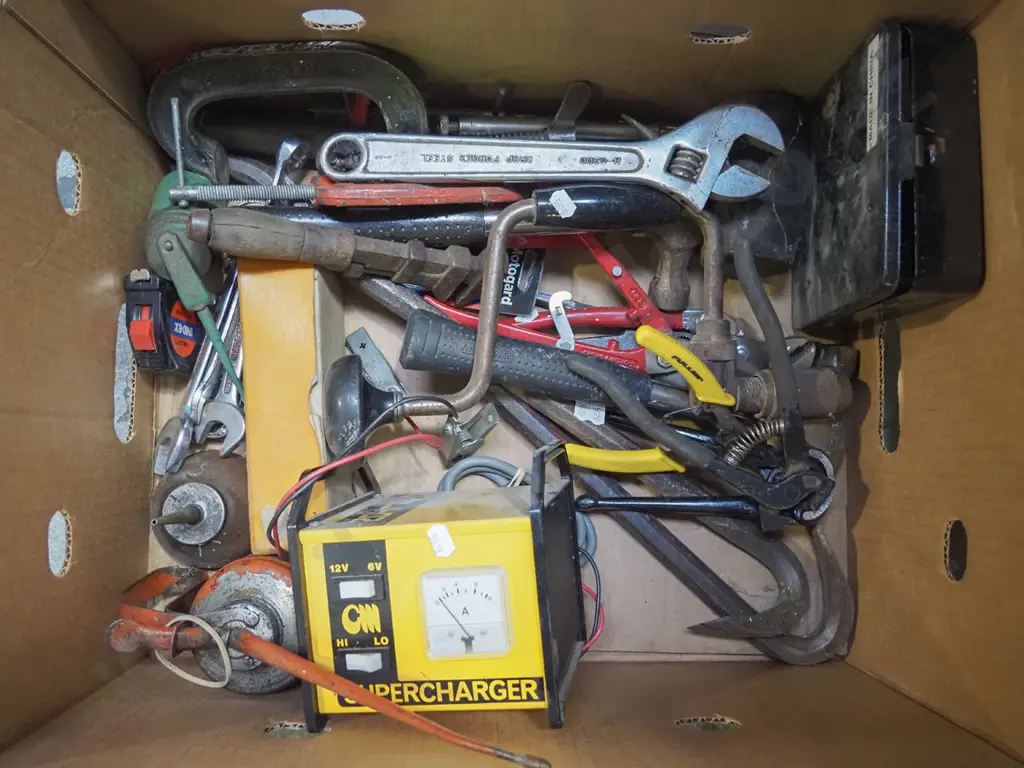 box; battery charger, oiler, crescent etc Image 1++
