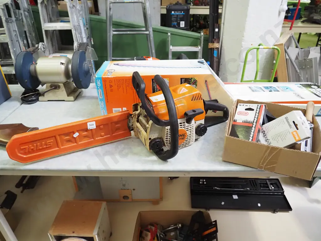 Stihl MS 170 chainsaw and box of accessories Image 1++