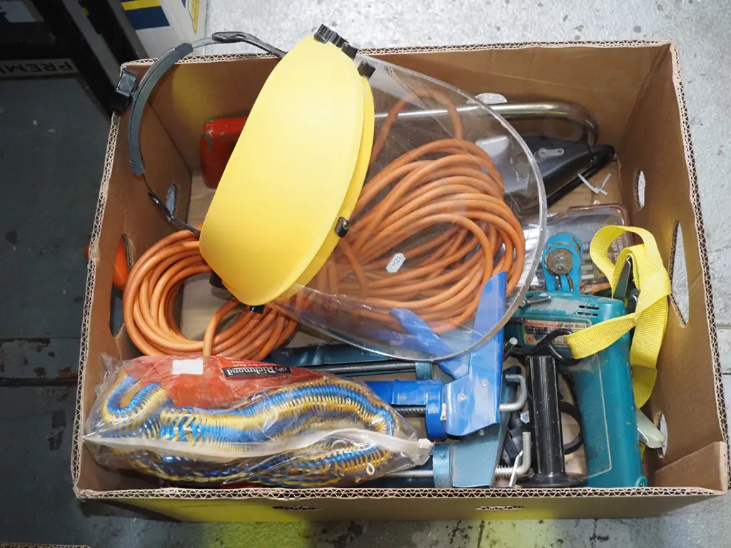 box; proctective face shield, caulking guns, extension cord etc Image 1++