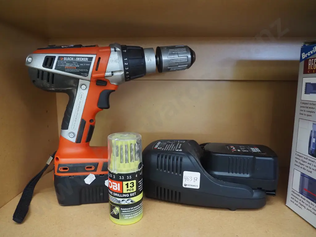 Black & Decker cordless drill, charger and 2 batteries, Ryobi drill bits Image 1++