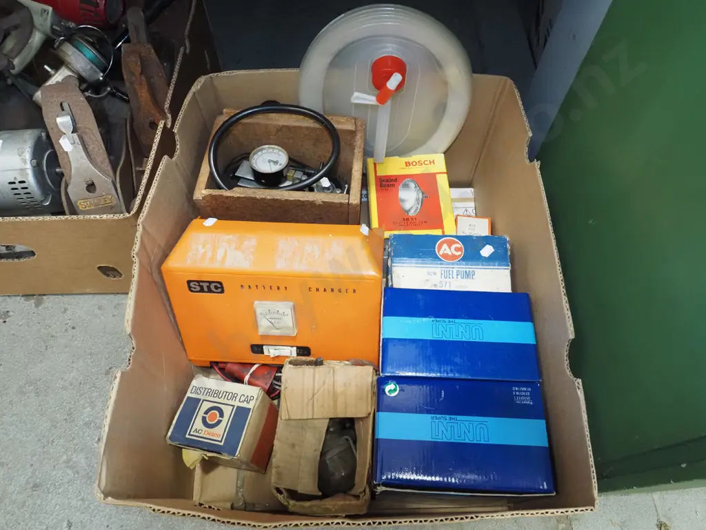 box; battery charger, 12V air compressor, light fittings, rotary display stands etc Image 1++
