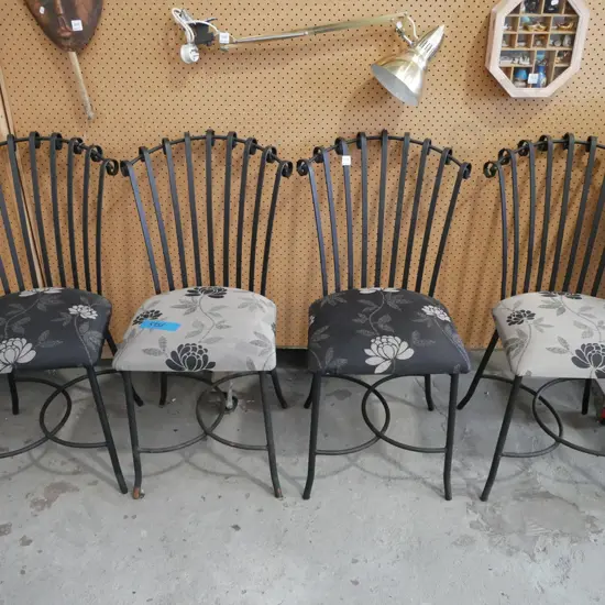 4x wrought metal and floral patio chairs