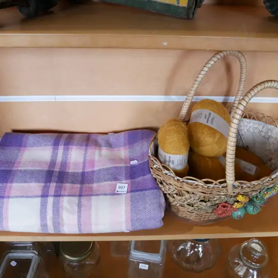 checked woollen blanket, basket, knitting yarn