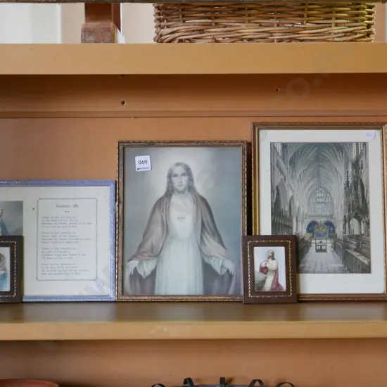 shelf; various religious prints