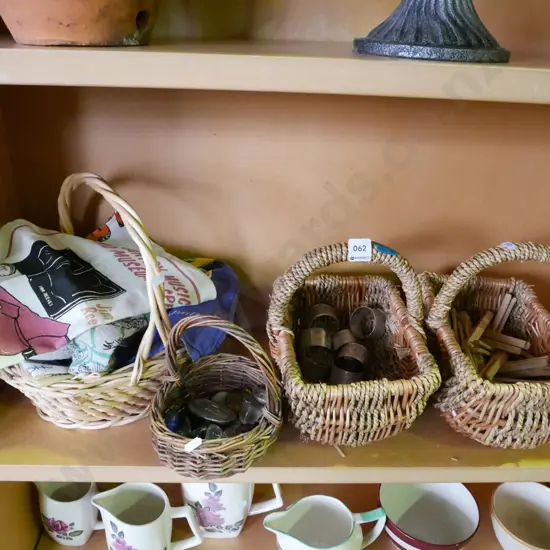 shelf; baskets, napkin rings, pegs, polished stones etc
