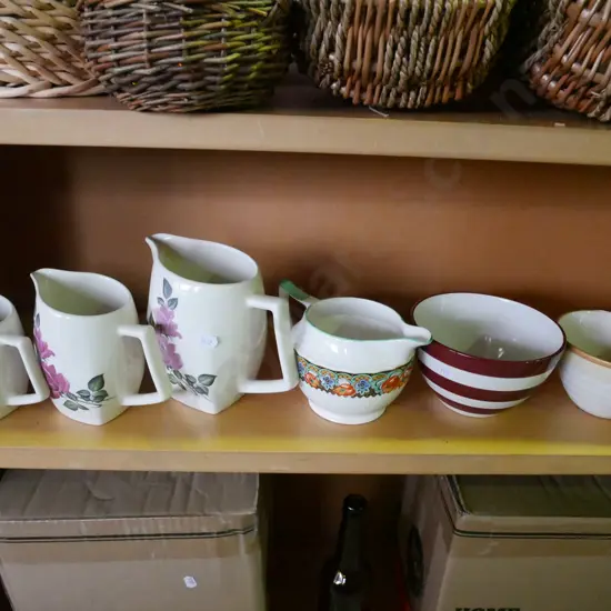 shelf; 4x jugs, 2x small mixing bowls