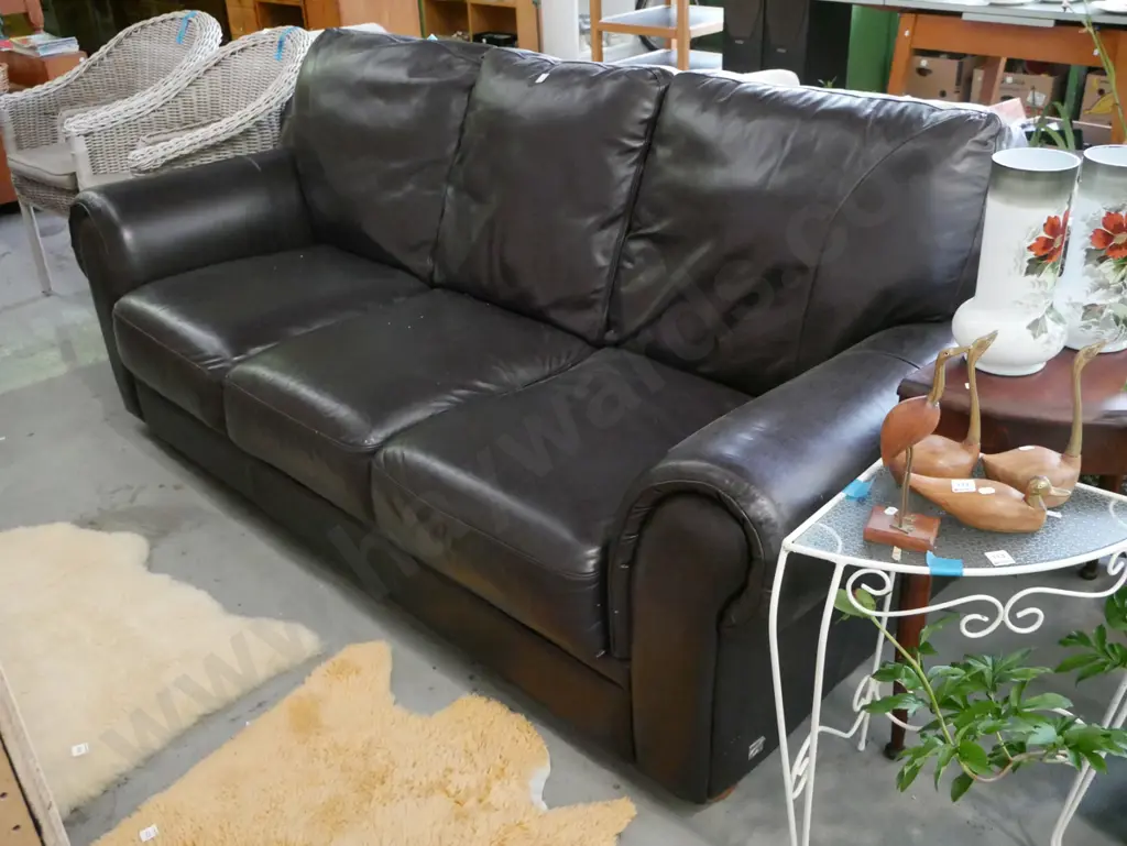 brown leather rolled arm 3 seater settee in tidy condition H-920 W-2130 D-880 Image 1++
