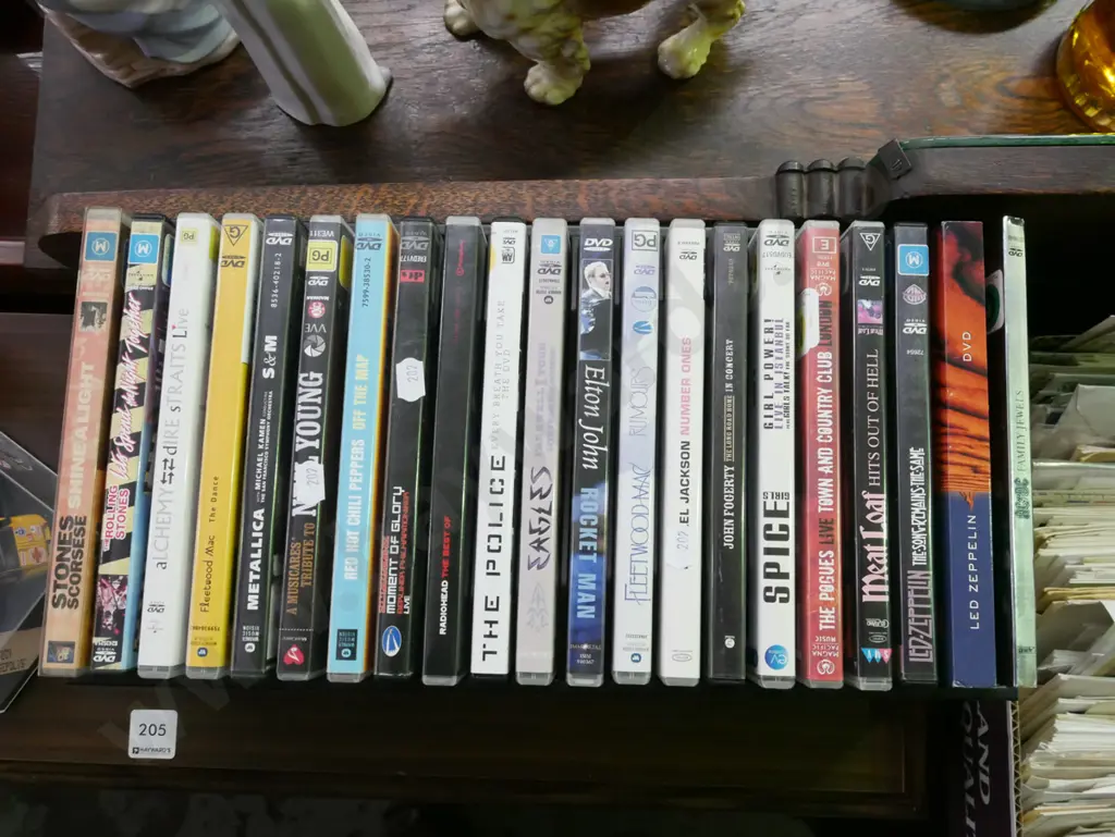 musical DVDs in storage rack Image 1++