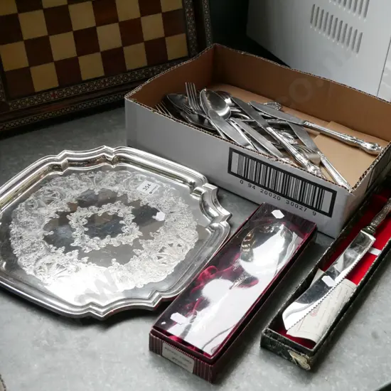 cutlery, plated tray, knife, serving spoon
