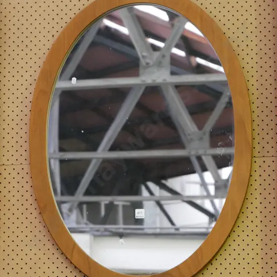 wood framed oval wall mirror