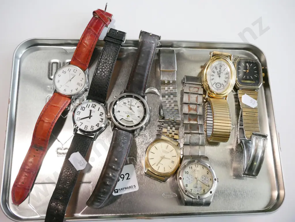 tin tray of various wristwatchess Image 1++