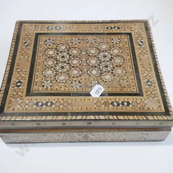 carved parquetry box with necklaces