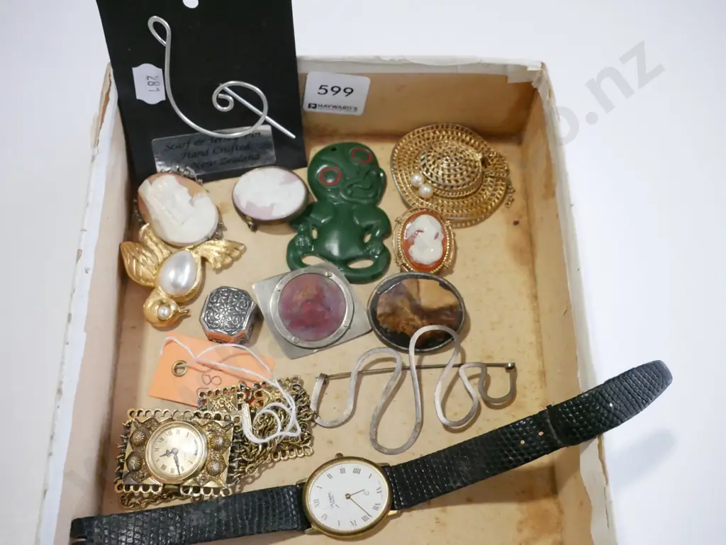 box; plastic tiki, watches, cameo brooches etc Image 1++