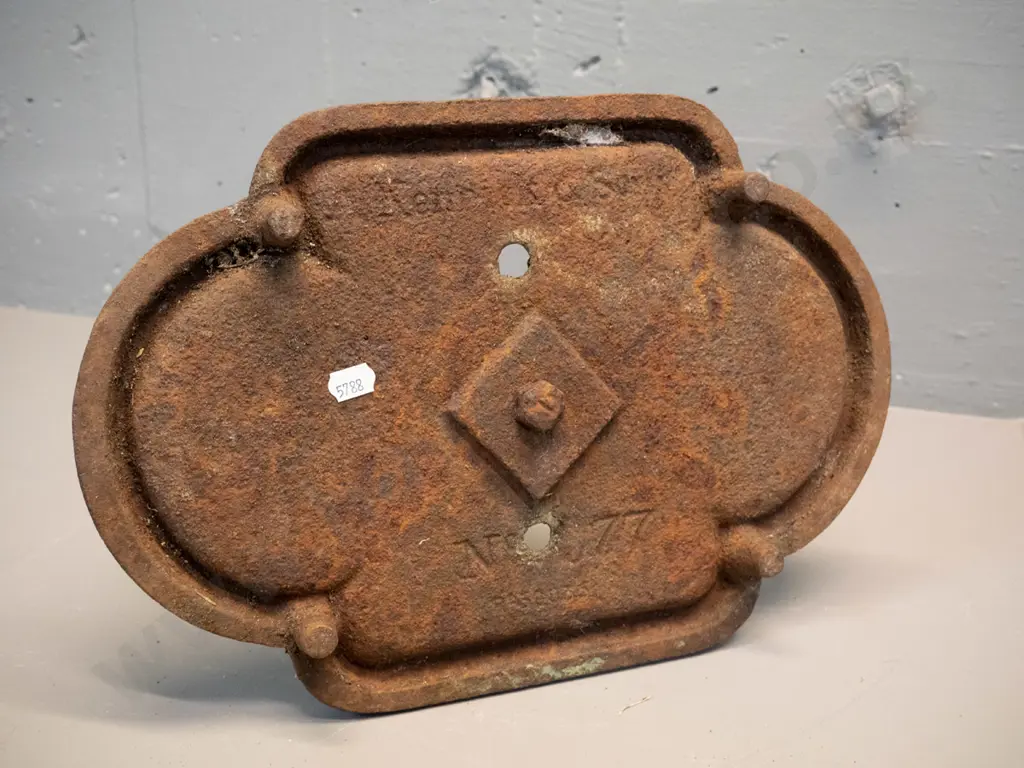 vintage cast iron boot scraper - overall surface corrosion, hard to read mark on base, might be Kenrick & No. 77 Image 1++