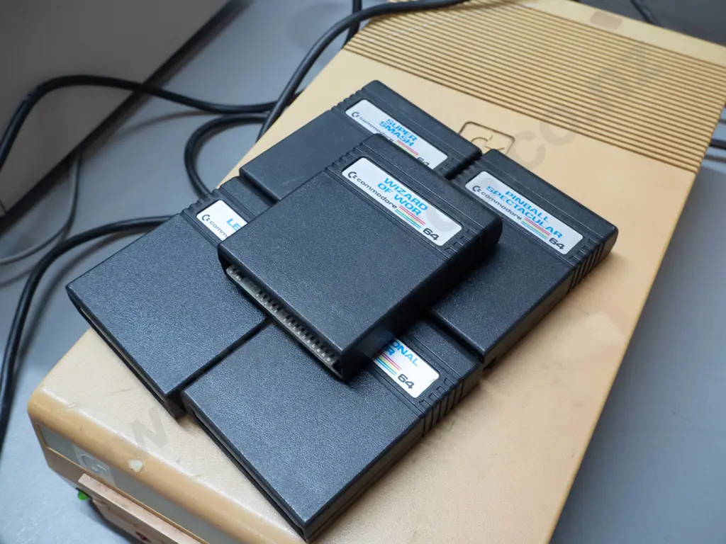 1980s Commodore 64 computer with CRT, tape drive, floppy drive, game cartridges, controllers, floppies etc - powers up, Image 1++