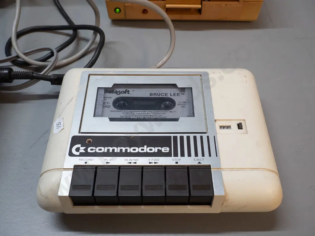 1980s Commodore 64 computer with CRT, tape drive, floppy drive, game cartridges, controllers, floppies etc - powers up, Image 1++