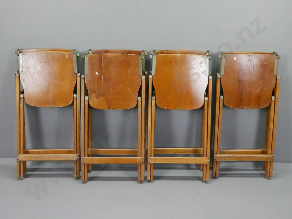 8 vintage folding chairs with rimu ply seats and backs, fluted legs, metal caps and mechanisms - some w/ original decal: Image 1++