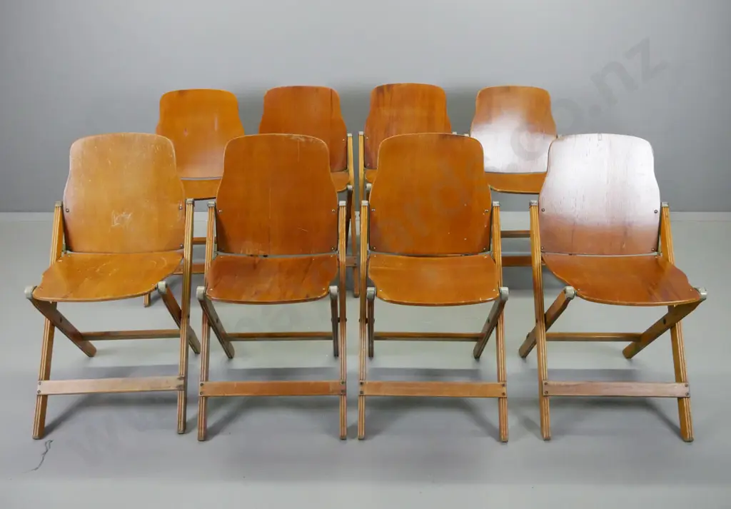 8 vintage folding chairs with rimu ply seats and backs, fluted legs, metal caps and mechanisms - some w/ original decal: Image 1++