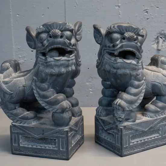 pair of heavy carved grey stone foo dogs with loose-carved balls in mouths H-250 L-160