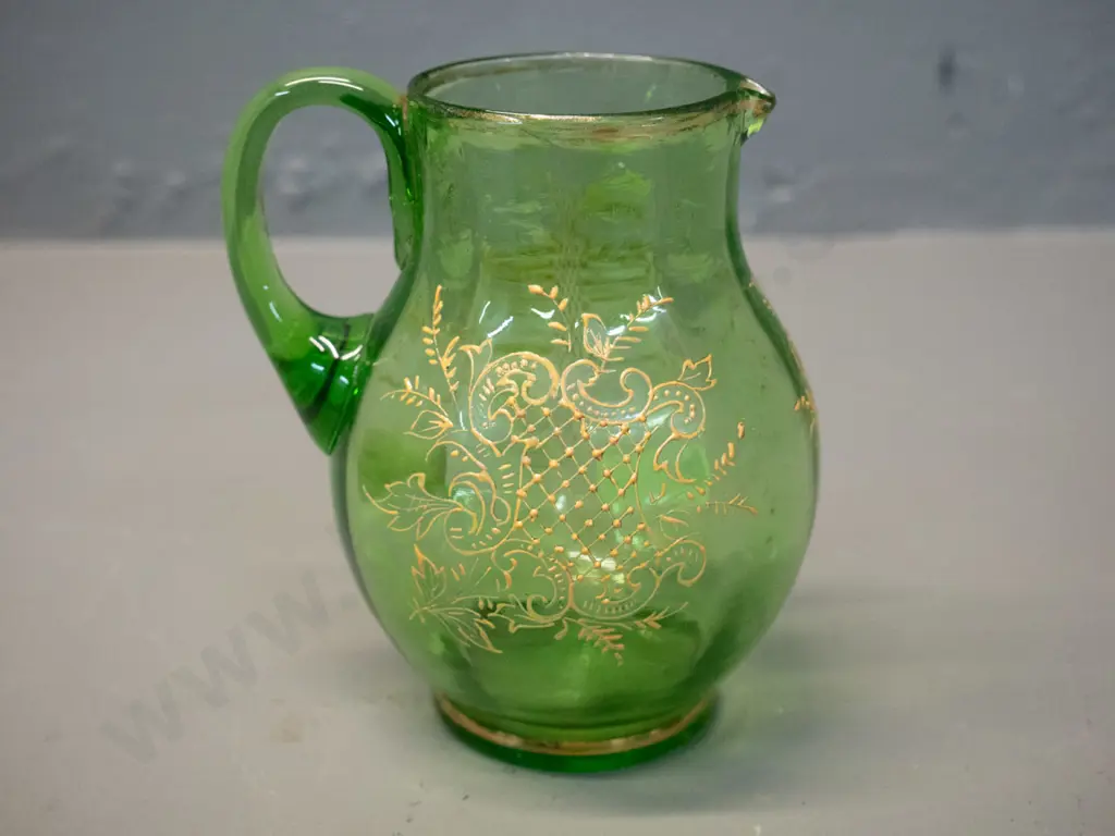 vintage green uranium glass jug with raised decoration, some wear to gilt on rim H-110 Image 1++