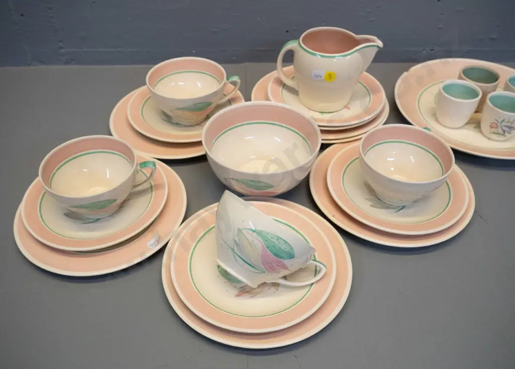 Susie Cooper teaware - 4 trios, cream & sugar, extra plates, plus a plate and 4 eggcups with damage and/or staining Image 1++