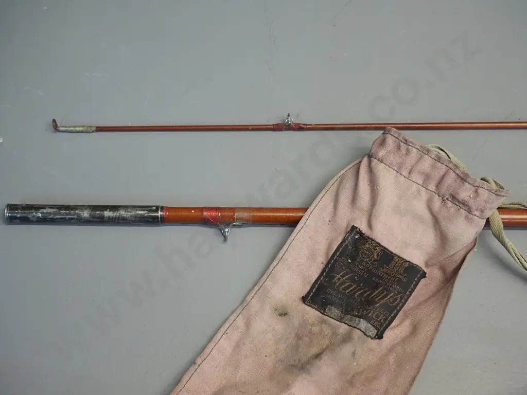 2-piece split cane fishing rod in canvas sleeve with Hardy's label - longer section is L-1400 Image 1++