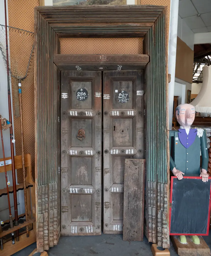 heavy Indian Madurai carved hardwood entrance door - 2 doors, cast metal drop handle, metal studding Image 1++