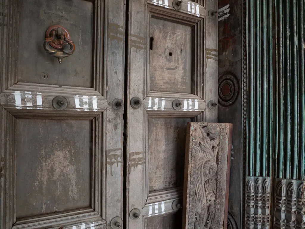 heavy Indian Madurai carved hardwood entrance door - 2 doors, cast metal drop handle, metal studding Image 1++