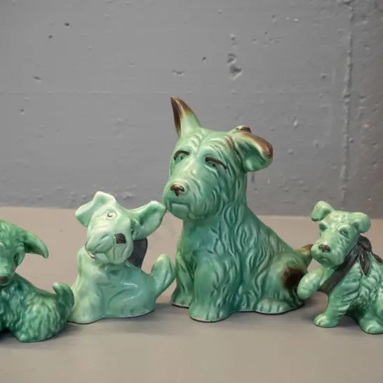 4 green Sylvac dogs - largest is H-170 W-140