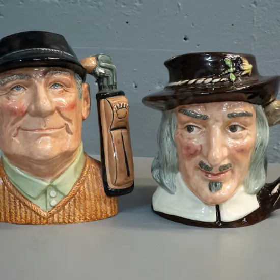 2 Royal Doulton character jugs - Izaac Walton Compleat Angler H-190 and Golfer (small chip to base)