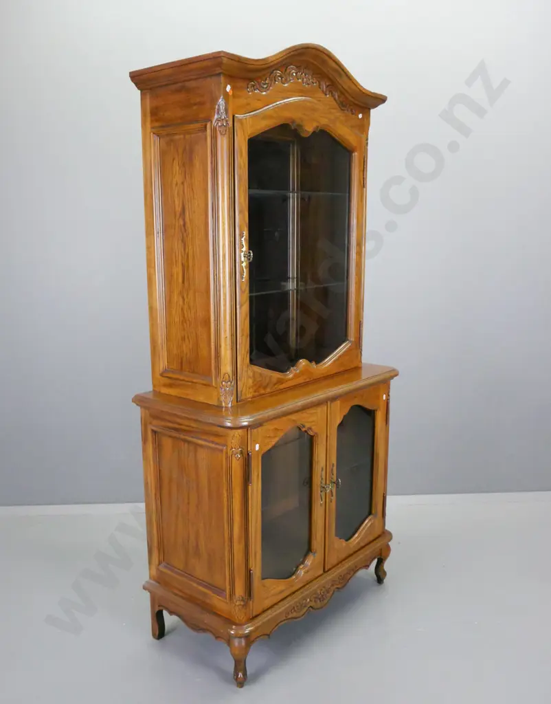 reproduction oak and elm display cabinet with single top and 2 lower glazed shaped cupboard doors, mirrored back on top, Image 1++