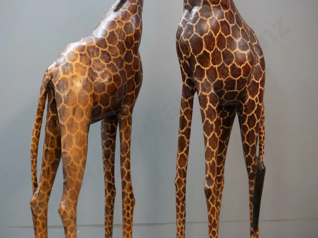 pair of very tall hand painted and carved jacaranda timber giraffes - slightly taller one H-1260, has crack where tail Image 1++