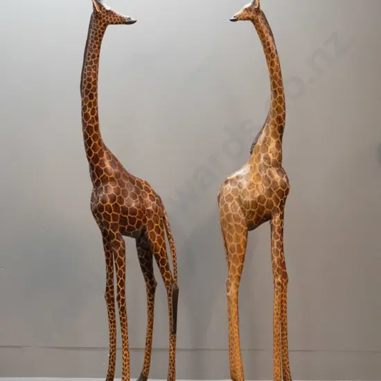pair of very tall hand painted and carved jacaranda timber giraffes - slightly taller one H-1260, has crack where tail