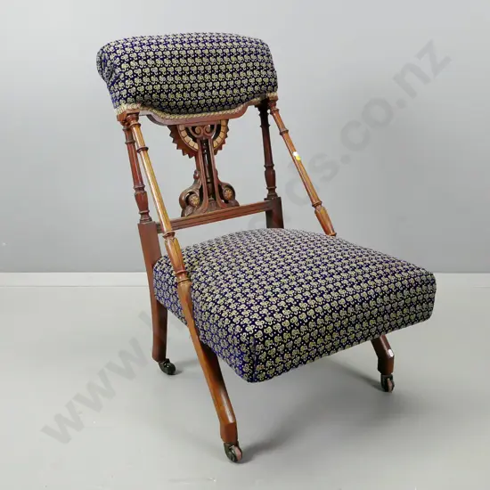Victorian walnut bedroom chair with carved and turned back splat, turned & fluted side supports, on porcelain casters,