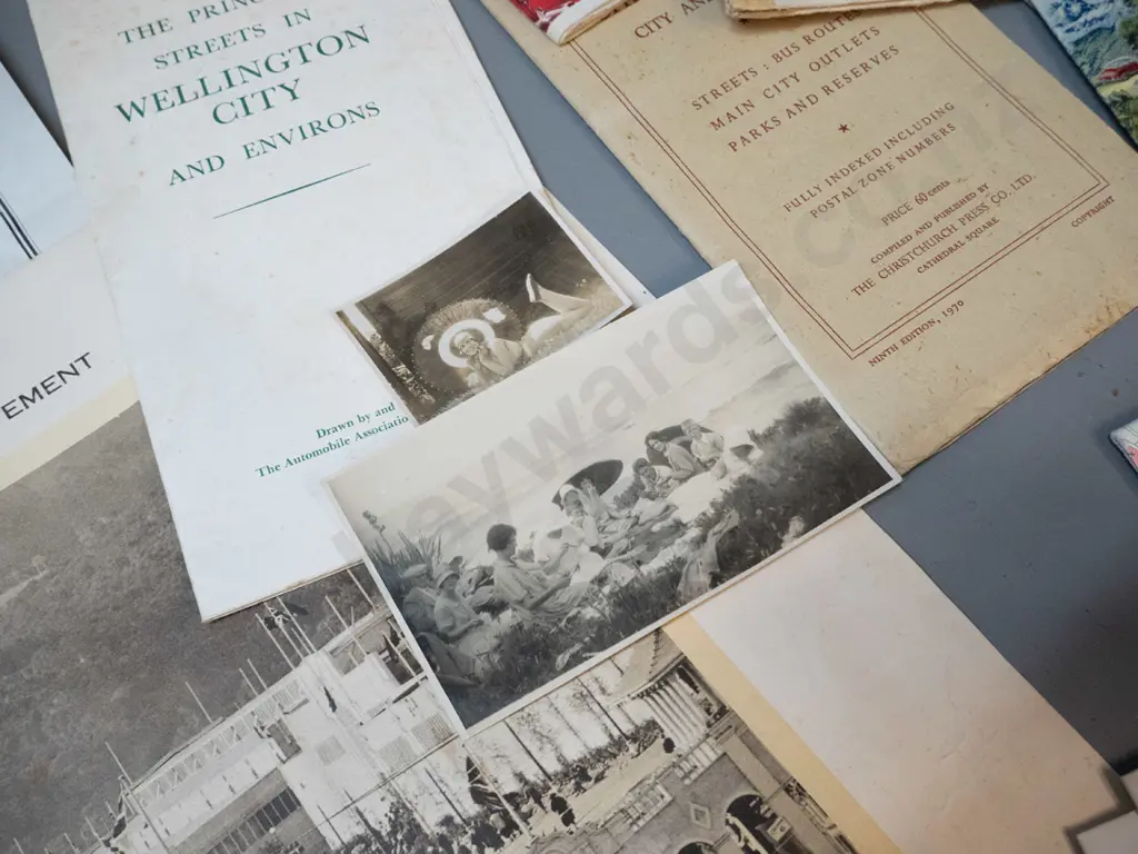 assorted New Zealand road maps and directories, a Dunedin Exhibition print, 2 small photos, and a 1959 map of Dunedin Image 1++