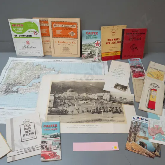 assorted New Zealand road maps and directories, a Dunedin Exhibition print, 2 small photos, and a 1959 map of Dunedin
