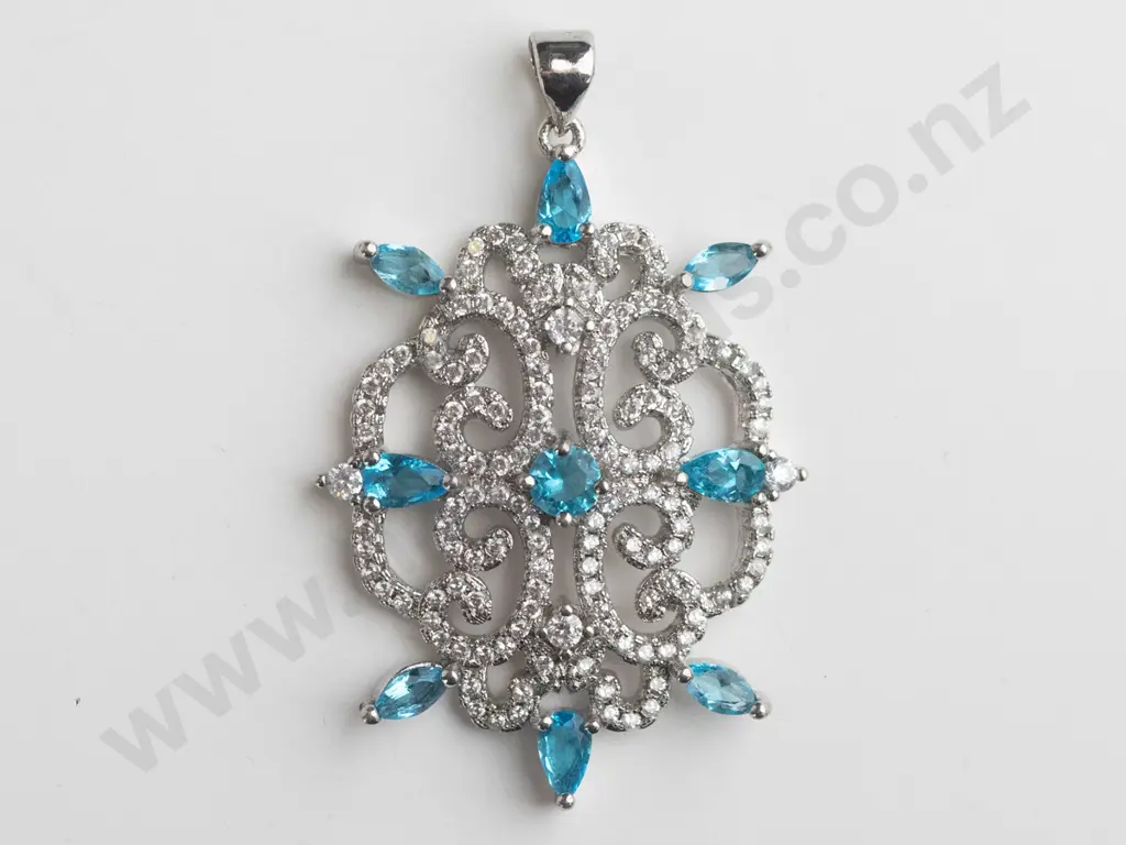 silver pendant with light blue stones stamped 925 [no chain] Image 1++