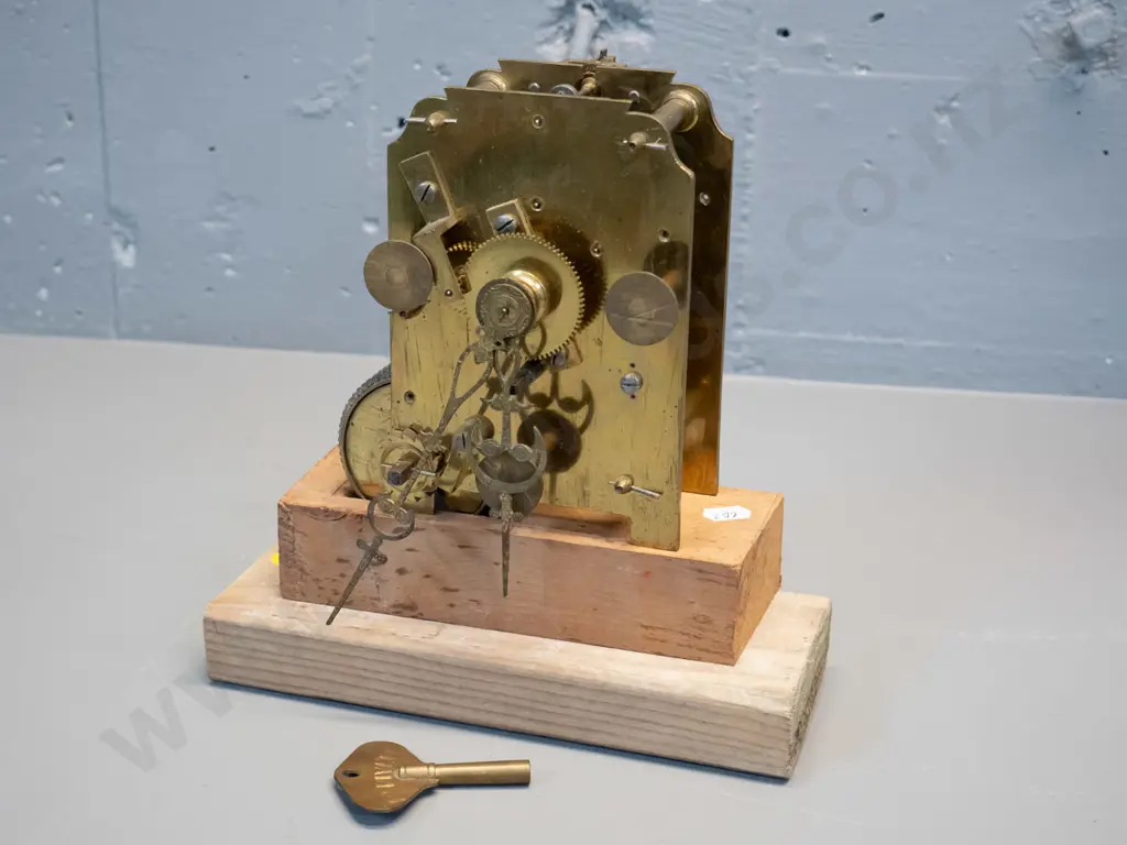 brass "Fusee" clock movement mounted to home made wooden stand, with pendulum key. Note attributes to Humphrey 93, but Image 1++