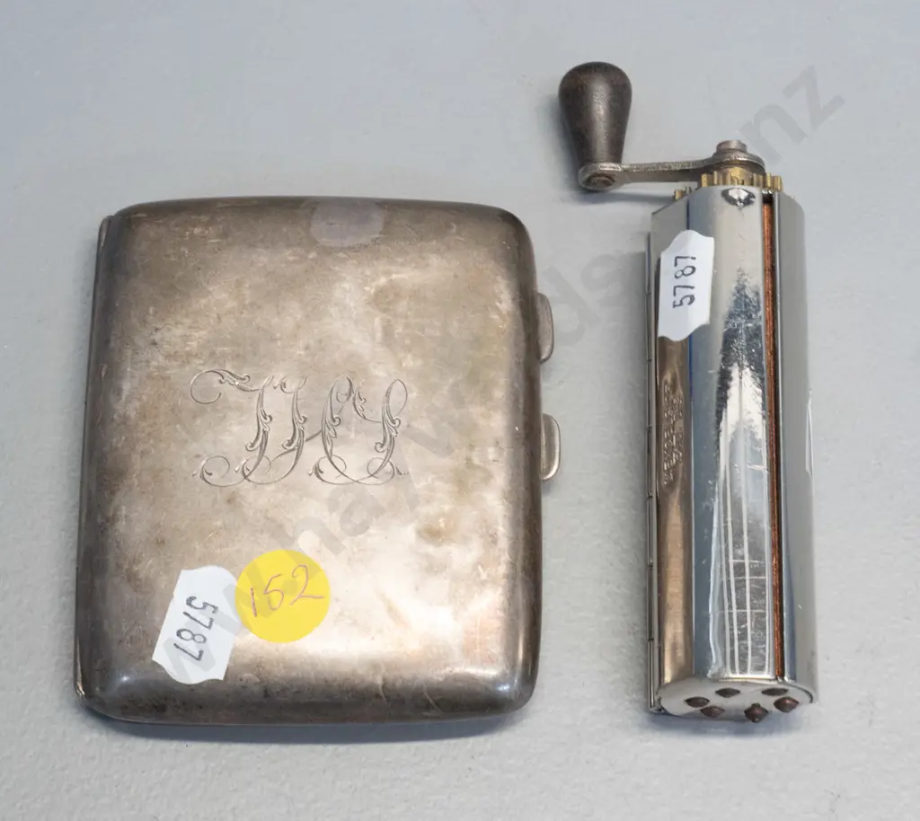 sterling silver cigarette case 70 x 85 and a chrome hand-crank Excelsior cigarette rolling machine Image 1++