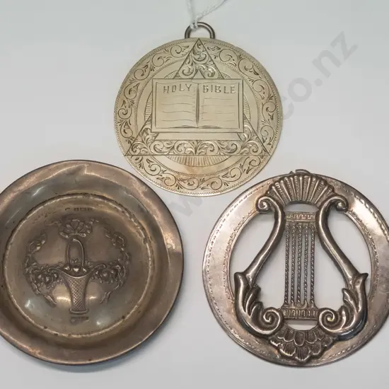 sterling silver "Holy Bible" disc/medallion, sterling silver small dish or lid with impressed designs,and a medallion