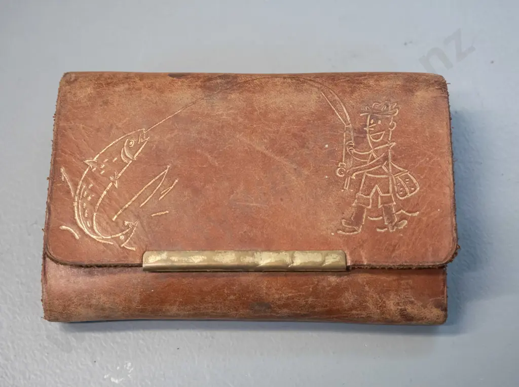 fish-shaped pocket knife with compact Fish-O-Mat spring scale / measuring tape both in fitted leather case with trout Image 1++
