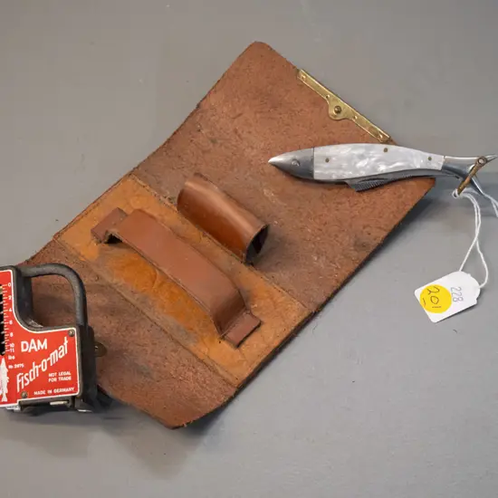 fish-shaped pocket knife with compact Fish-O-Mat spring scale / measuring tape both in fitted leather case with trout